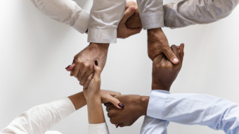 Business hands joined together teamwork