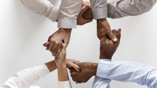 Business hands joined together teamwork